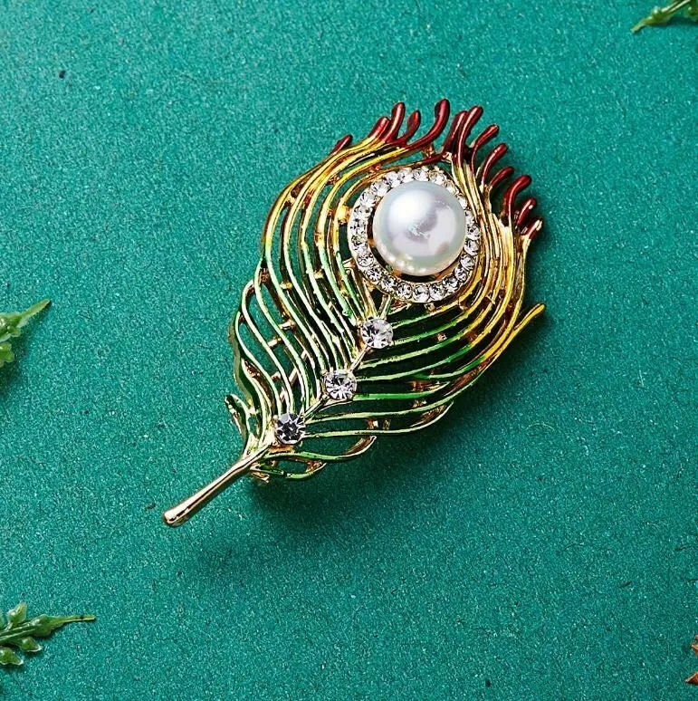 Stunning vintage look gold plated retro feather celebrity brooch broach pin z10